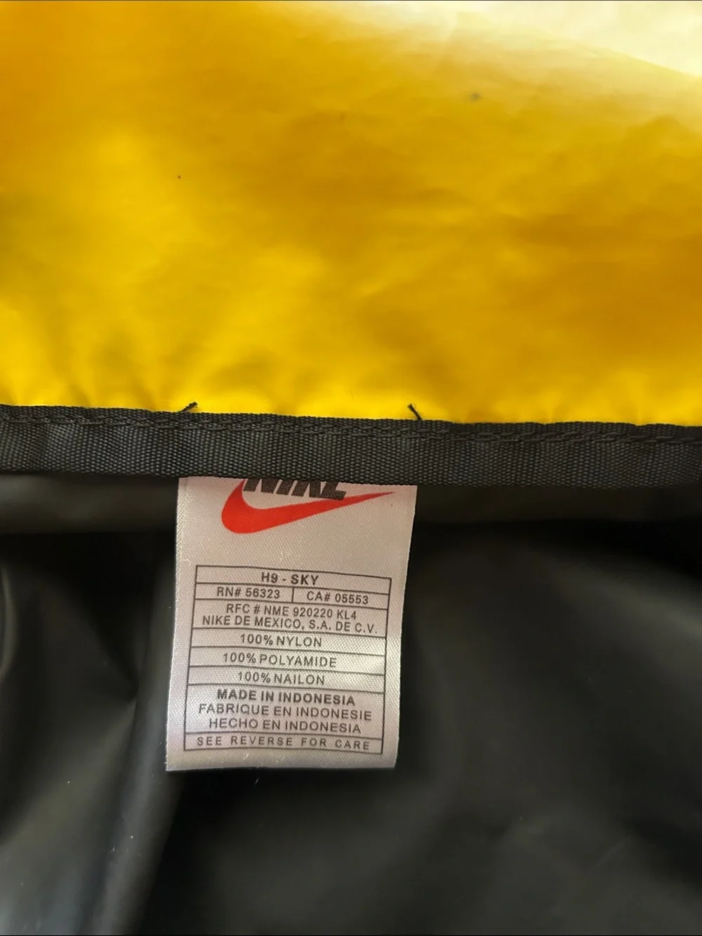 Vintage Nike Black and Yellow Duffel Bag with Logo Stripe